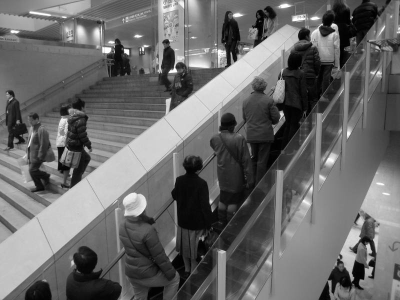 people on stairs and escalator
